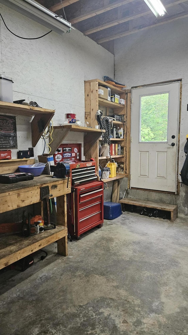 67 Upper Narrows Rd, Long Pond Twp, ME 04945 - basement with a workshop area