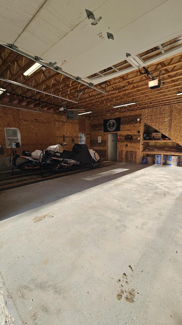 67 Upper Narrows Rd, Long Pond Twp, ME 04945 - garage with a garage door opener