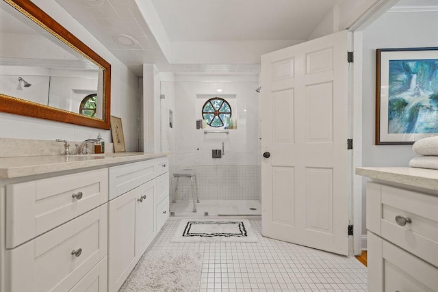 555 Pool St, Biddeford, ME 04005 - full bathroom featuring vanity, a stall shower, and tile patterned flooring