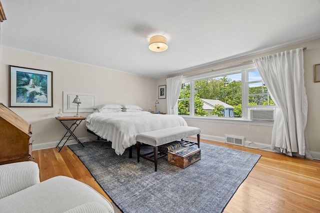 555 Pool St, Biddeford, ME 04005 - bedroom with wood finished floors and ornamental molding