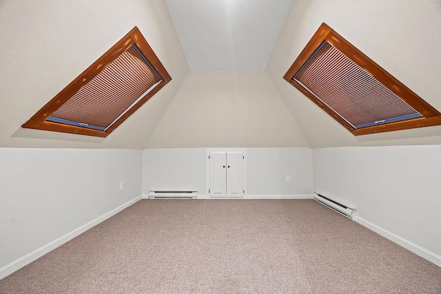 555 Pool St, Biddeford, ME 04005 - bonus room with baseboard heating, vaulted ceiling, and carpet floors