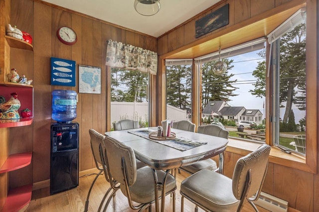 1522 Richville Rd, Standish, ME 04084 - dining room with wood walls, light wood-style floors, and healthy amount of natural light