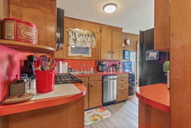 1522 Richville Rd, Standish, ME 04084 - kitchen featuring stainless steel dishwasher, brown cabinetry, light wood-style flooring, and light countertops