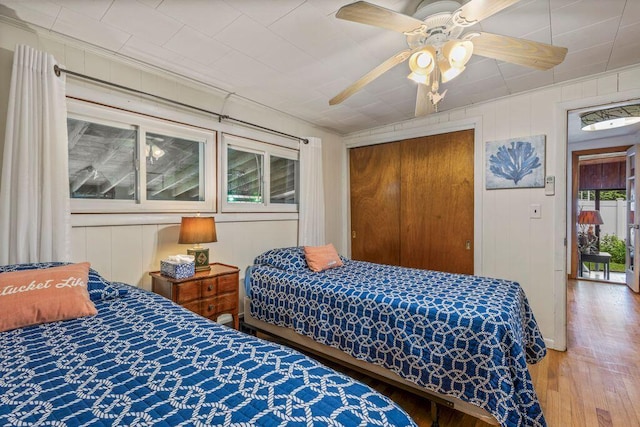 1522 Richville Rd, Standish, ME 04084 - bedroom featuring wood finished floors, a closet, and ceiling fan