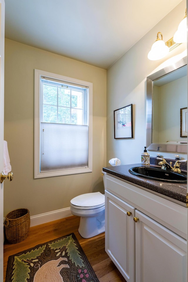 42 Stonehurst Dr, Camden, ME 04843 - bathroom with wood finished floors and vanity
