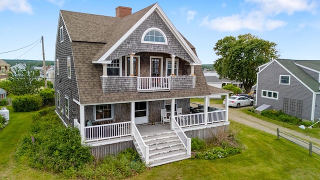 6 Fort Hill Ave Unit 1, York, ME 03909 - shingle-style home with roof with shingles, a balcony, a porch, a front yard, and a chimney