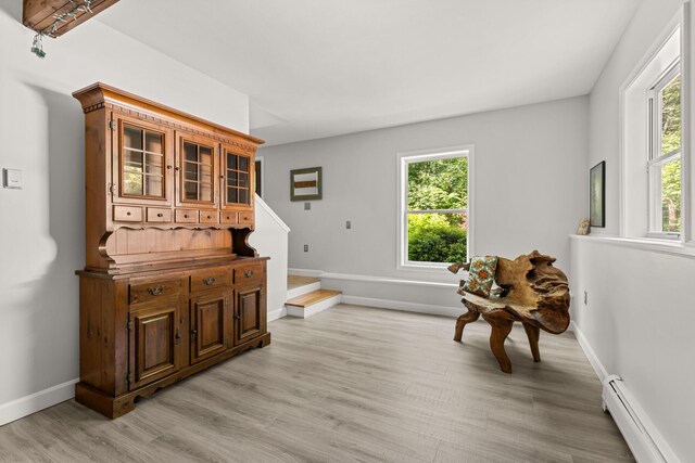 2 Teressa Ln, York, ME 03909 - sitting room featuring baseboard heating, healthy amount of natural light, light wood-style flooring, and stairs