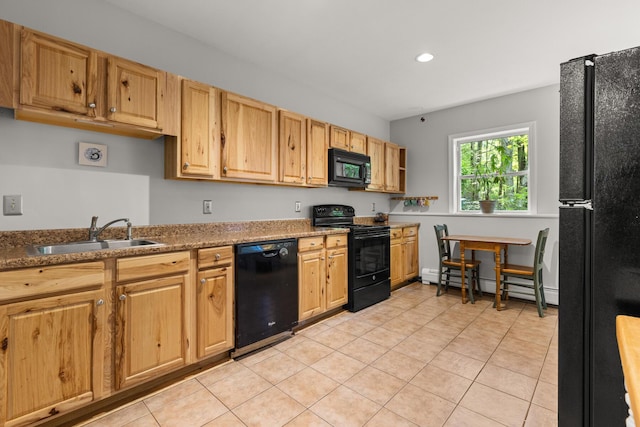 2 Teressa Ln, York, ME 03909 - kitchen with black appliances, recessed lighting, light tile patterned flooring, and a baseboard radiator