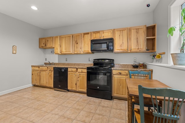 2 Teressa Ln, York, ME 03909 - kitchen with black appliances, light tile patterned flooring, open shelves, recessed lighting, and light stone counters
