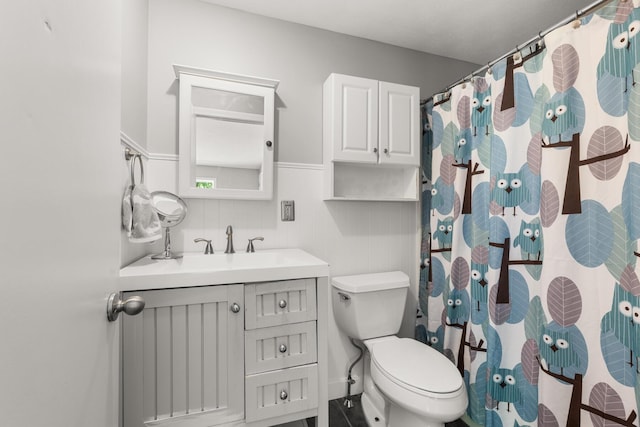 2 Teressa Ln, York, ME 03909 - bathroom with vanity, a wainscoted wall, and a shower with shower curtain