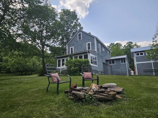 28 Varnum Pond Rd, Temple, ME 04984 - rear view of house featuring a yard