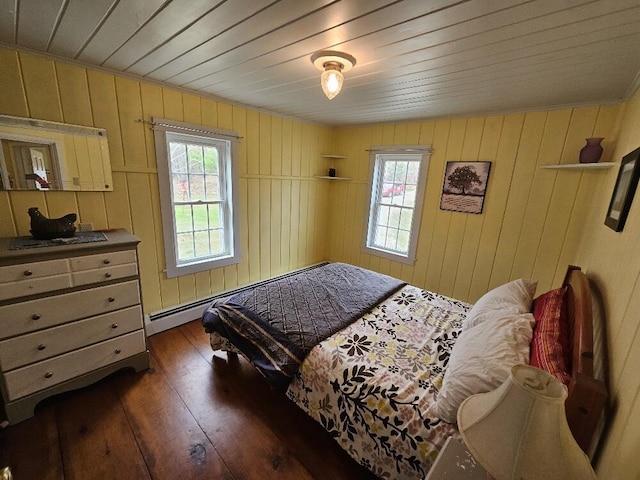 28 Varnum Pond Rd, Temple, ME 04984 - bedroom with dark wood-type flooring, wooden ceiling, and wooden walls