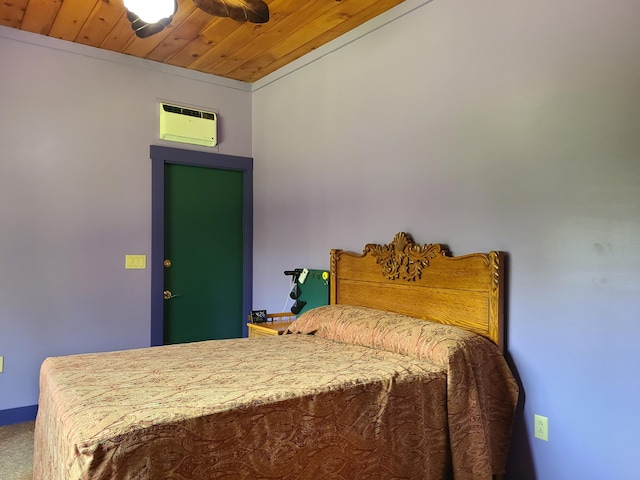 163 Ayer Ridge Rd, Freedom, ME 04941 - bedroom with a wall mounted AC, wooden ceiling, and carpet