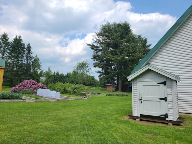 163 Ayer Ridge Rd, Freedom, ME 04941 - view of green lawn featuring a shed