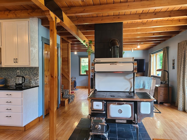 163 Ayer Ridge Rd, Freedom, ME 04941 - basement with light wood-style flooring, plenty of natural light, and wooden ceiling