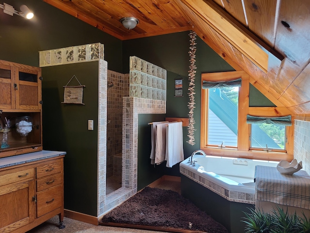 163 Ayer Ridge Rd, Freedom, ME 04941 - bathroom featuring vaulted ceiling, wood ceiling, a tile shower, and a bath