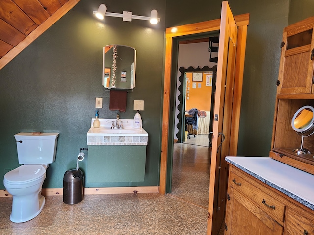 163 Ayer Ridge Rd, Freedom, ME 04941 - bathroom with vanity and baseboards
