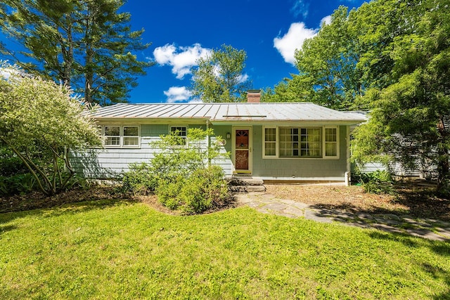 184 Mountain St, Camden, ME 04843 - ranch-style house featuring a front lawn, a standing seam roof, a chimney, and a metal roof