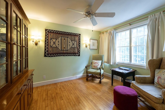184 Mountain St, Camden, ME 04843 - living area with light wood-type flooring and a ceiling fan
