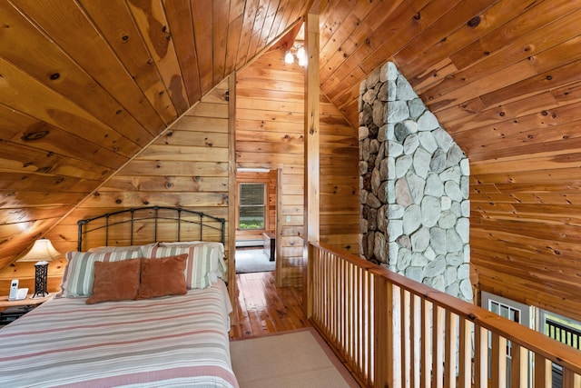 50 Flagg Way, Fayette, ME 04349 - unfurnished bedroom with wood ceiling, wood walls, lofted ceiling, and hardwood / wood-style flooring