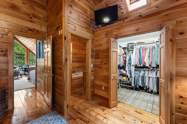 50 Flagg Way, Fayette, ME 04349 - hall with light wood finished floors and wooden walls