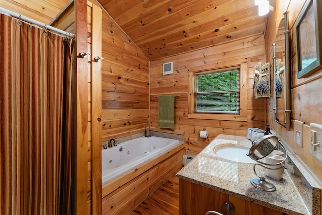 50 Flagg Way, Fayette, ME 04349 - bathroom featuring vaulted ceiling, a whirlpool tub, wood ceiling, vanity, and a baseboard heating unit