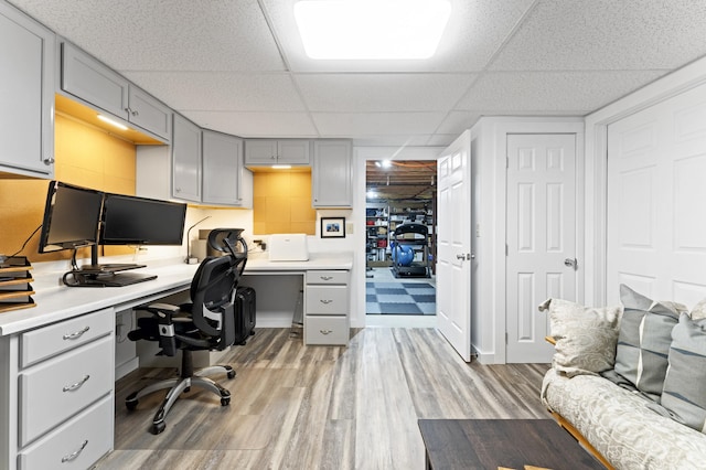 50 Flagg Way, Fayette, ME 04349 - office space with built in desk, a paneled ceiling, and light wood finished floors