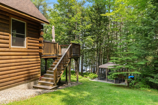 50 Flagg Way, Fayette, ME 04349 - view of green lawn featuring a wooden deck and stairway