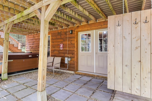 50 Flagg Way, Fayette, ME 04349 - view of exterior entry with a hot tub and a patio