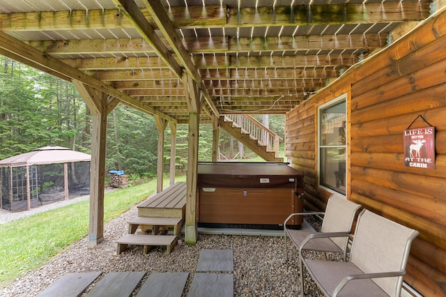 50 Flagg Way, Fayette, ME 04349 - view of patio / terrace featuring a hot tub, stairs, and a gazebo