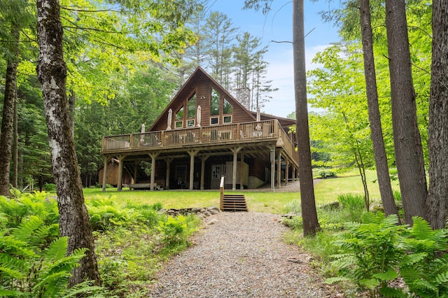 50 Flagg Way, Fayette, ME 04349 - view of front of property featuring a wooden deck and stairway