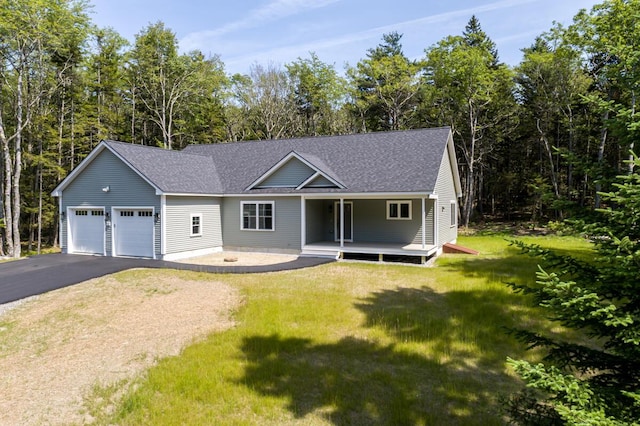 59 Sagamore Dr Lot 28, Phippsburg, ME 04562 - view of front of property with an attached garage, roof with shingles, driveway, a front yard, and a porch