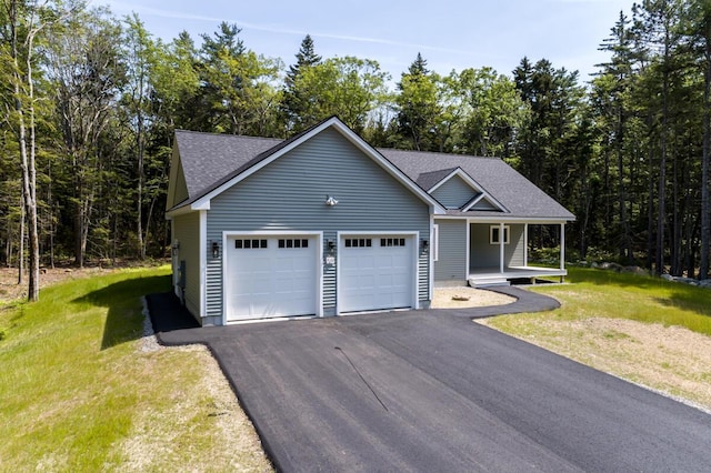 59 Sagamore Dr Lot 28, Phippsburg, ME 04562 - view of front of property with an attached garage, asphalt driveway, roof with shingles, and a front lawn