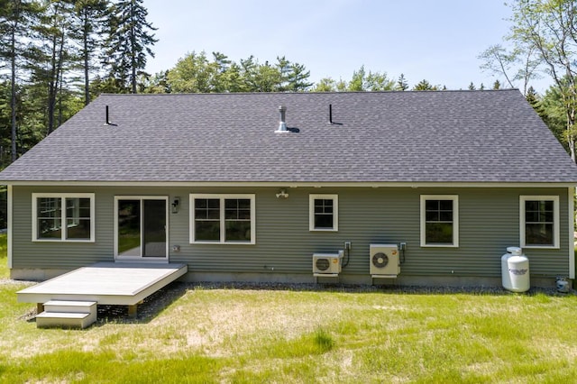 59 Sagamore Dr Lot 28, Phippsburg, ME 04562 - back of property with roof with shingles, a wooden deck, and a yard