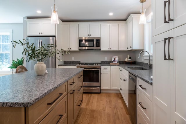 59 Sagamore Dr Lot 28, Phippsburg, ME 04562 - kitchen with appliances with stainless steel finishes, light wood-type flooring, recessed lighting, and white cabinetry