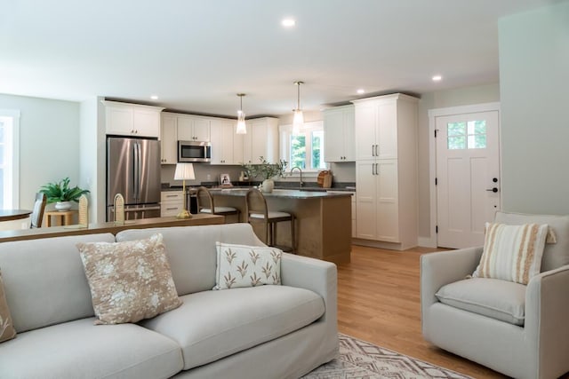 59 Sagamore Dr Lot 28, Phippsburg, ME 04562 - living room with plenty of natural light, recessed lighting, and light wood-style floors