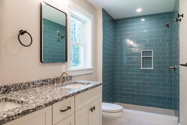 59 Sagamore Dr Lot 28, Phippsburg, ME 04562 - full bathroom featuring double vanity, tiled shower, and recessed lighting