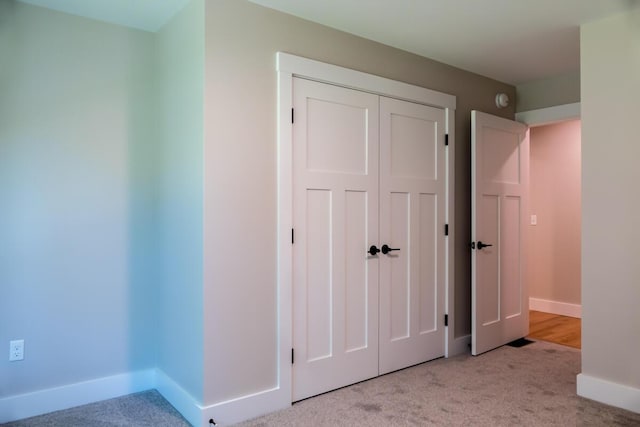 59 Sagamore Dr Lot 28, Phippsburg, ME 04562 - unfurnished bedroom featuring light colored carpet and a closet