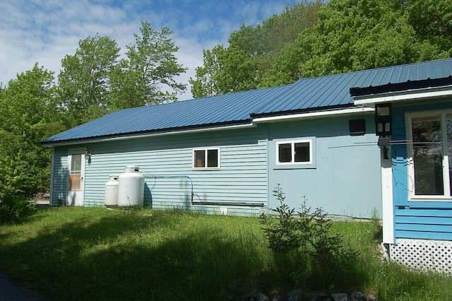 803 Main Rd, Burlington, ME 04417 - view of home's exterior featuring a metal roof