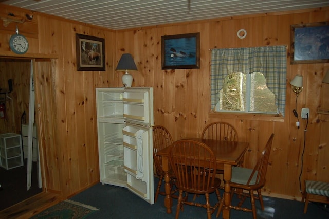 803 Main Rd, Burlington, ME 04417 - dining area featuring wood walls