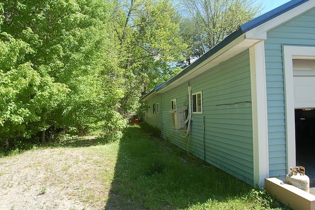 803 Main Rd, Burlington, ME 04417 - view of home's exterior with a garage