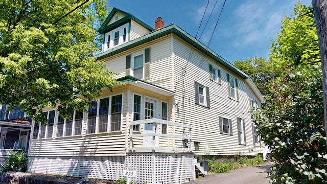 295 French St, Bangor, ME 04401 - view of side of home featuring a chimney