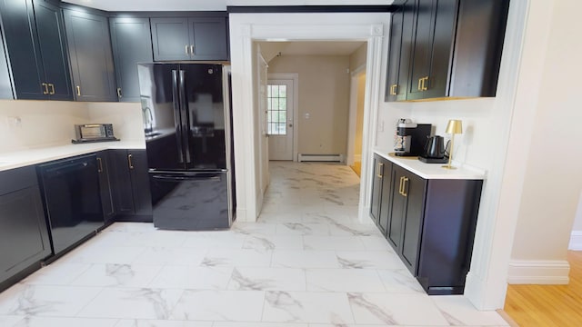 295 French St, Bangor, ME 04401 - kitchen featuring black appliances, light marble finish flooring, a baseboard radiator, and light countertops