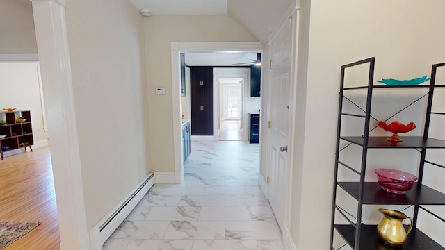 295 French St, Bangor, ME 04401 - hall featuring a baseboard heating unit and light marble finish floors