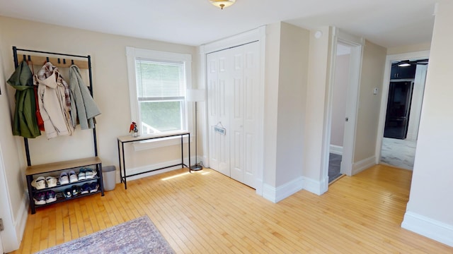 295 French St, Bangor, ME 04401 - foyer entrance with wood-type flooring and baseboards