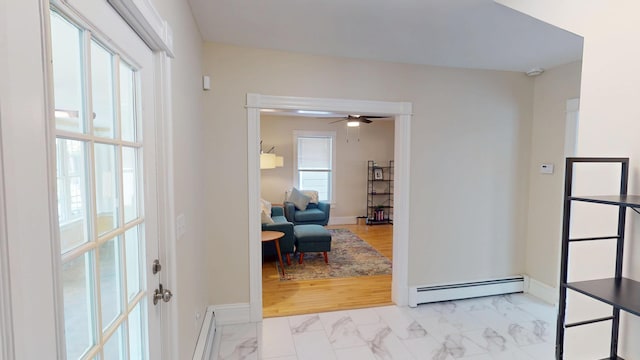 295 French St, Bangor, ME 04401 - hall featuring a baseboard heating unit and marble look tile flooring
