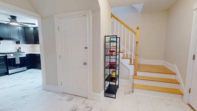 295 French St, Bangor, ME 04401 - stairway with marble look tiles and ceiling fan