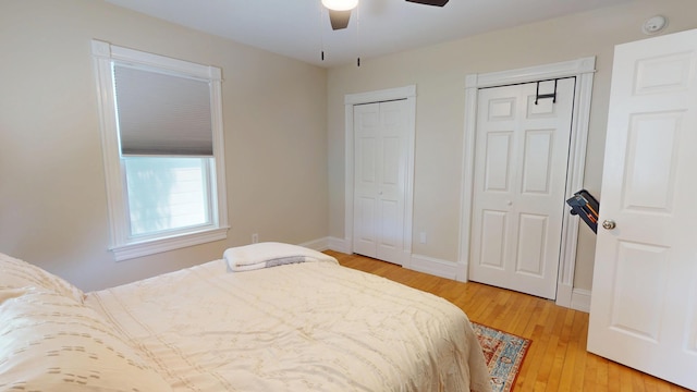 295 French St, Bangor, ME 04401 - bedroom with two closets, light wood finished floors, and a ceiling fan