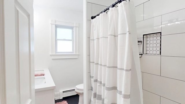 295 French St, Bangor, ME 04401 - full bath with a baseboard heating unit, vanity, and curtained shower
