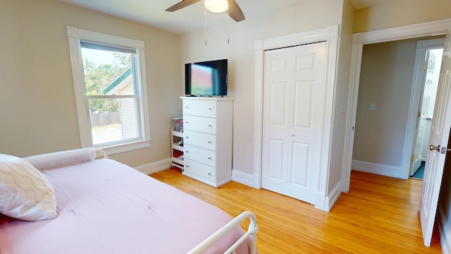 295 French St, Bangor, ME 04401 - bedroom with light wood-style flooring, a closet, and a ceiling fan